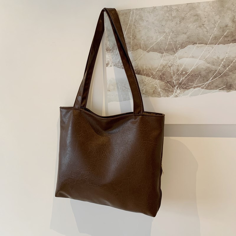 Bagos de vestir vintage de estilo perezoso para mujeres 2024 otoño nuevo paquete de hombro bajo la axila de la pequeña capacidad de la bolsa de hombro de viaje