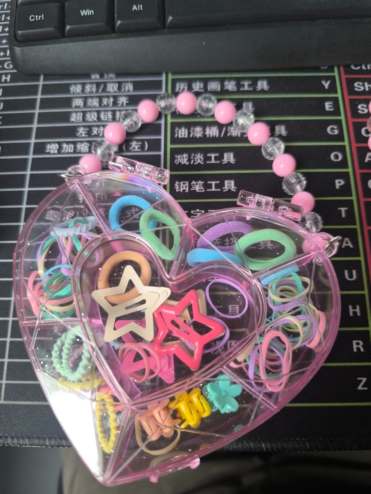 Venta directa de fábrica de coleteros para niños en cajas con forma de corazón, venta al por mayor en puestos callejeros