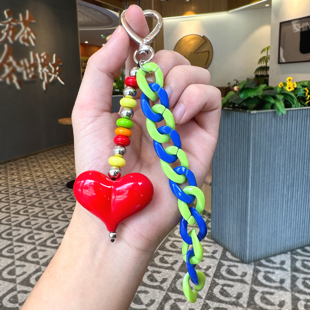 Nuevos productos transfronterizos creativos de letras de color cuerdas trenzadas llavero amor dibujos animados accesorios de diseño bolsos colgantes