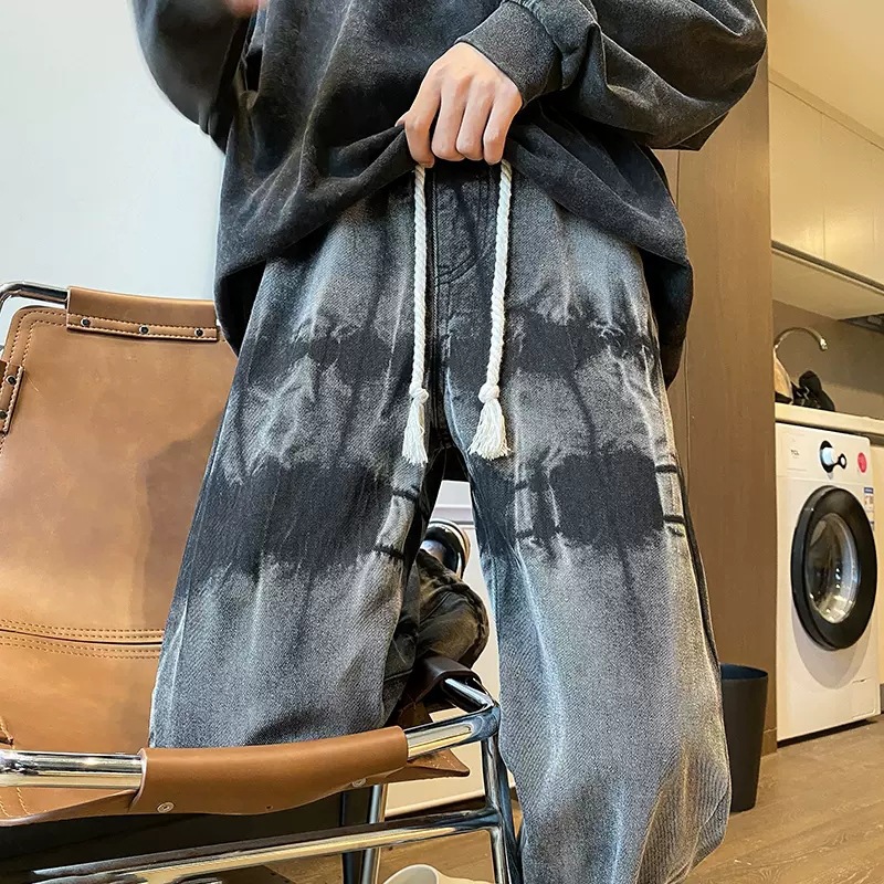 Pantalones europeos y americanos High Street Vibe ins marca de moda tie-dyed vintage drawstring jeans hombres American hiphop Pantalones rectos