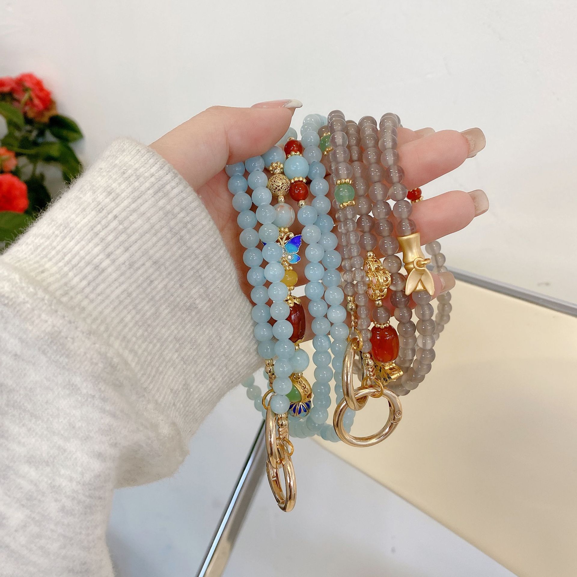 Boutique hecho a mano de alta gama para teléfono móvil cadena larga de ágata cloisonné femenina cordón de teléfono móvil de moda colgante de mensajero largo