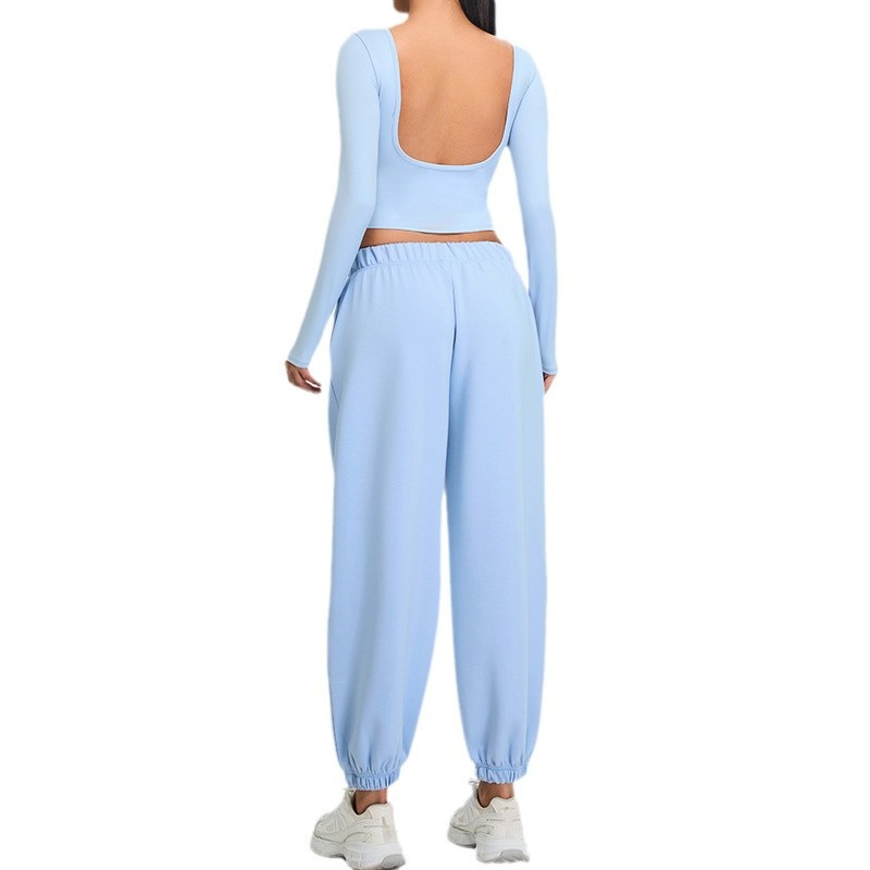 Otoño y invierno nuevo conjunto deportivo delgado de mujer U belleza de espalda manga larga ropa de yoga chaqueta de correr pantalones de fitness