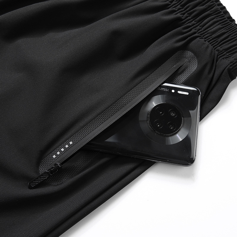 Pantalones cortos de seda de hielo de talla grande pantalones de baloncesto de secado rápido de grasa suelta de verano de los hombres pantalones cortos casuales deportivos fábrica al por mayor