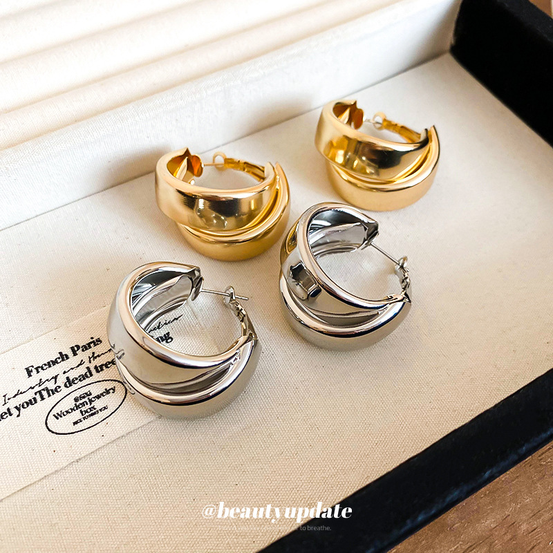 Pendientes redondos cruzados de doble capa Pendientes de diseño de estilo de metal de moda europea y americana Pendientes de temperamento simple de estilo frío