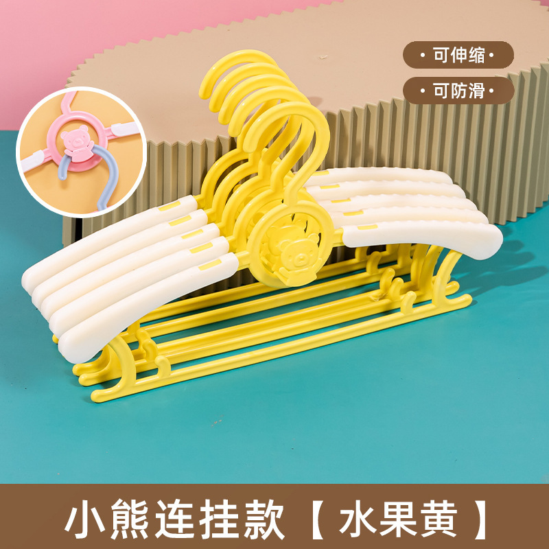 Tienda de ropa colgante T lindos oso de dibujos animados ajustable telescópico percha de ropa de plástico infantil percha telescópico