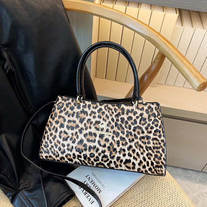 Bolso de gran capacidad 2023 nuevo bolso de mensajero de un solo hombro de moda bolso de patrón de piedra de superficie brillante simple bolso de textura