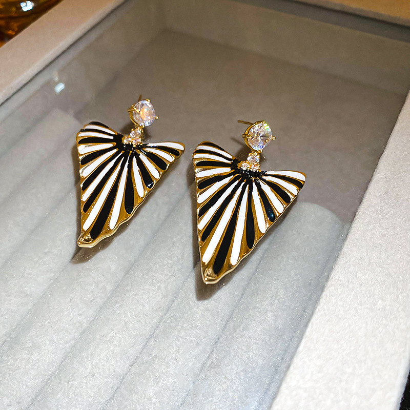 Golden black white triangle