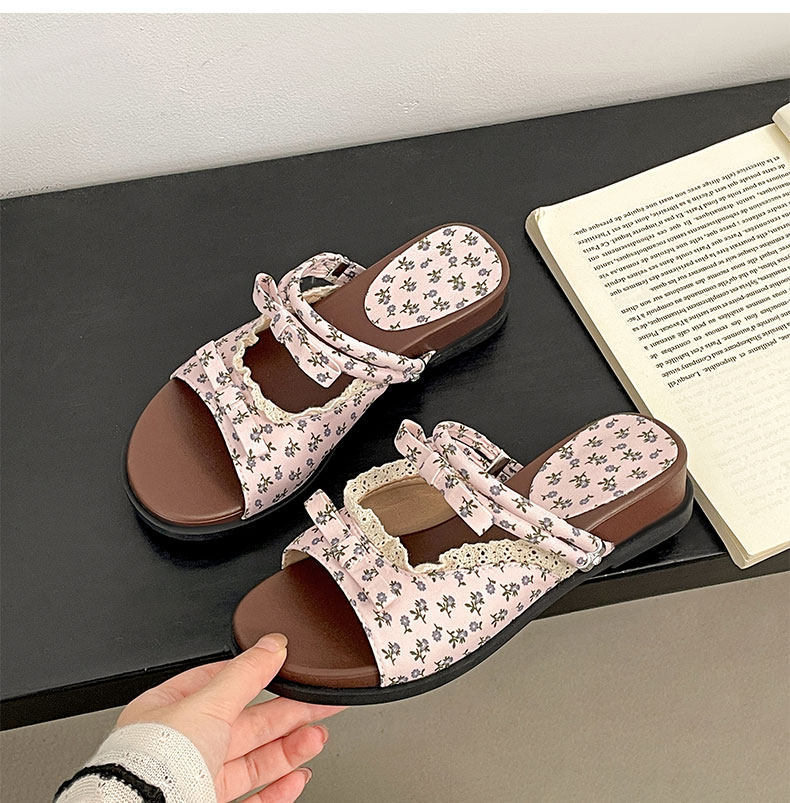 Zapatillas de encaje de arco de estilo francés de verano para mujeres 2026 nuevas sandalias con faldas de fondo grueso