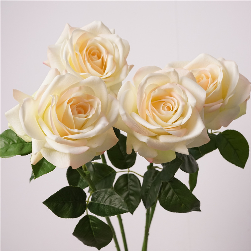 Nueva sensación de rosa humectante imitación flor de canto de mar de alta gama flores falsas decoración floral sala de estar vestíbulo suave