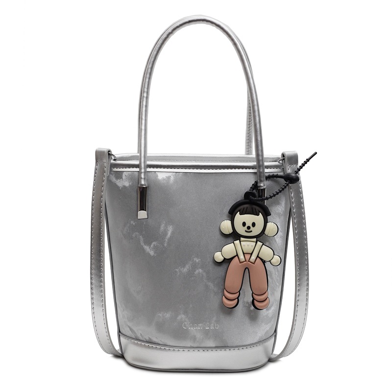 Tendencia versátil nicho de diseño de bolso de cubo de mano mujer 2025 nuevo estilo casual estilo extranjero sensación de alto hombro mochila