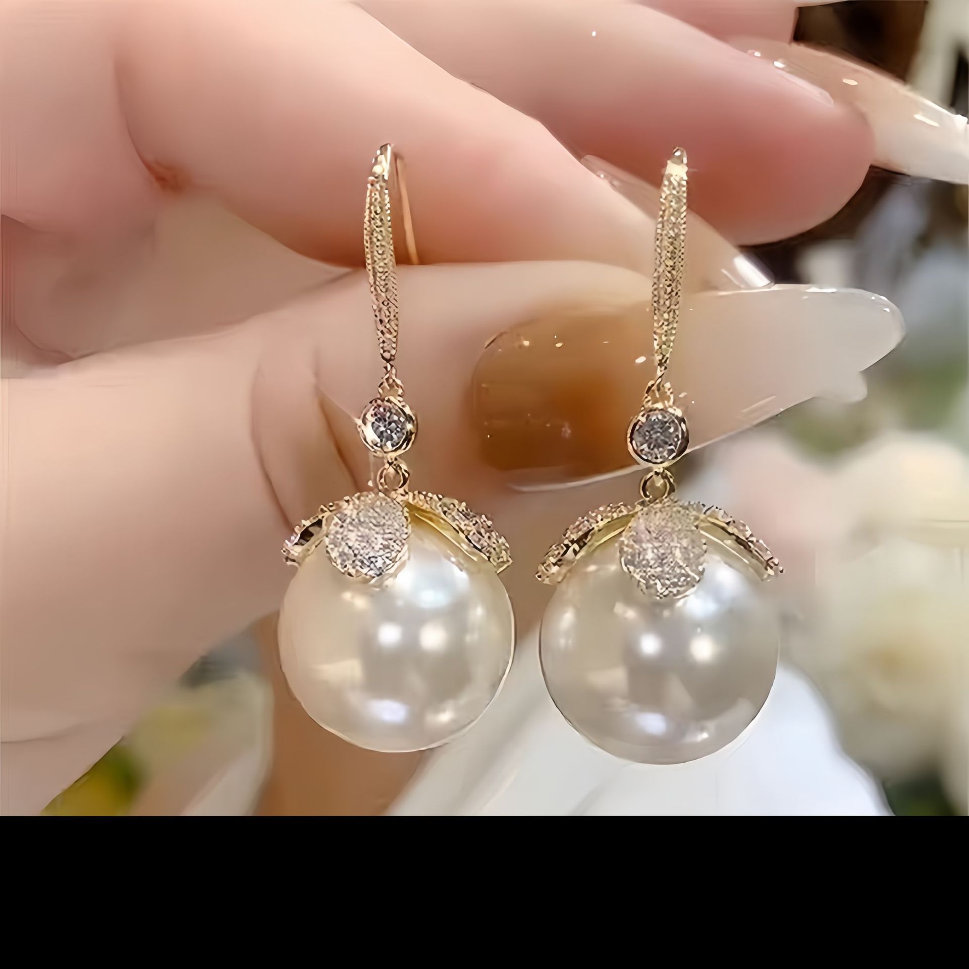 White earrings from pearl