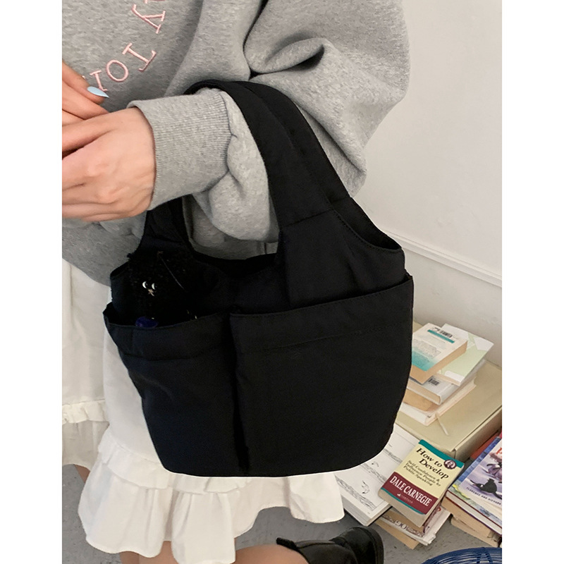 休闲简约手提包包女士包2025新款纯色尼龙布菜篮子包百搭水桶包|undefined