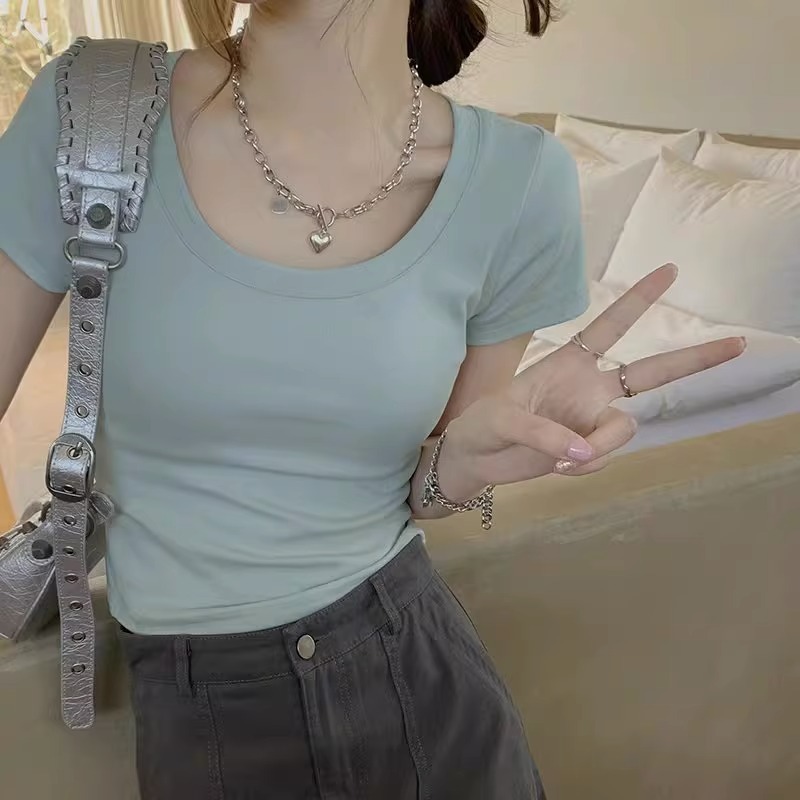 純欲u襟鎖骨tシャツの女性の肩の半袖の夏のタイトなギャルの純綿の臍の短い上着を代行します。|undefined