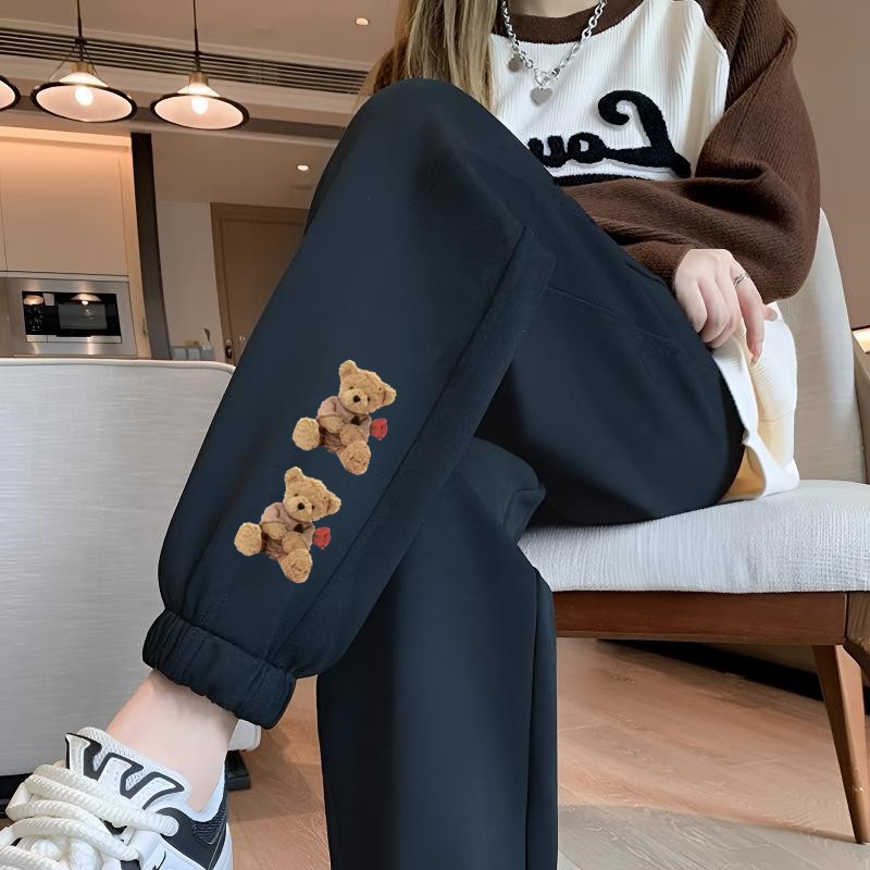 두 개의 불곰 레깅스가 달린 얇은 검은색 바지