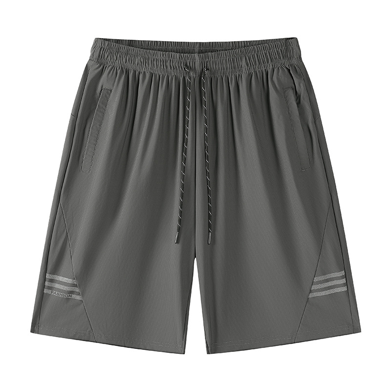 Pantalones cortos casuales para hombres en verano 2024 nueva versión coreana de la tendencia tubo recto relajado y ligero INS cinco división del trabajo pantalones de playa