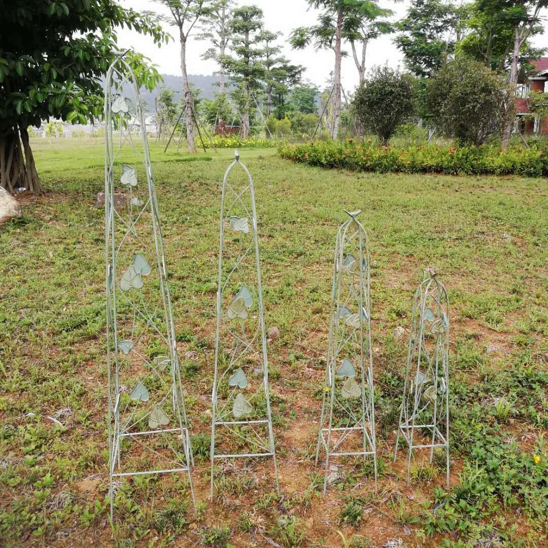 メーカー直売の鉄芸の葉の藤の棚の4つのセットの鉄線の蓮の立体の花の挿し込みの支柱の円錐の花の棚の卸売り