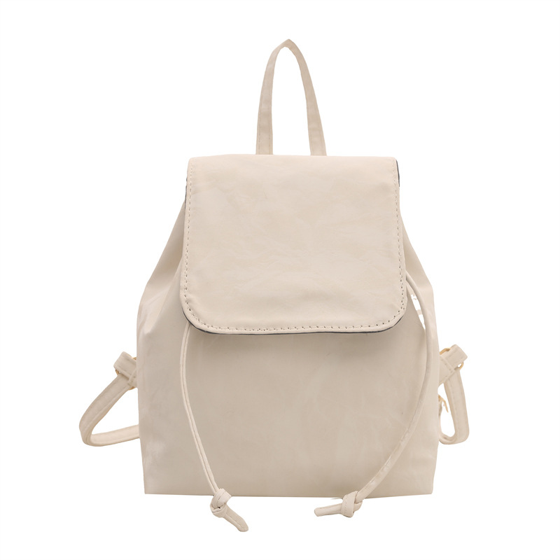 Mochila pequeña e retro ins estilo occidental mujer 2025 primavera nueva mochila de costura literaria simple y ligera