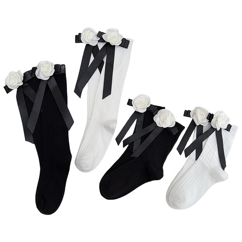 Camellia black bow calf socks Japanese style small fragrant girl middle tube retro Lolita pure desire calf socks