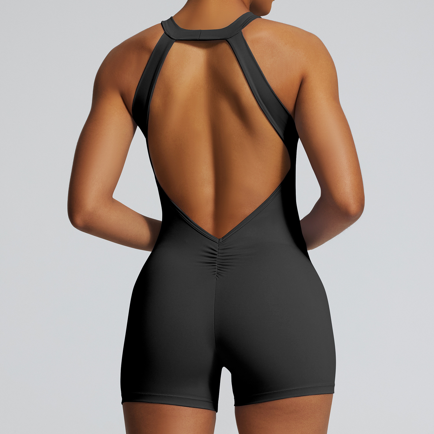 Traje de yoga de una pieza transfronterizo europeo y americano Traje de yoga deportivo para correr Traje de una pieza de fitness de cadera de melocotón ajustado de secado rápido de alta elasticidad