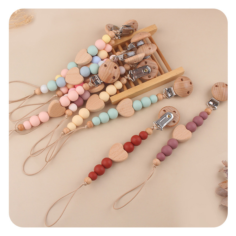 Productos para bebés Clip de chupete de madera de haya Dibujos animados de bebé creativo Amor de madera de haya Mordida de dreción de dientes Cadena de chupete anti-caída