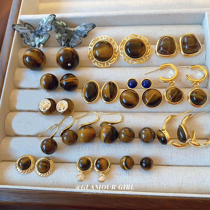 Pendientes de ojo de tigre artificial de color café Maillard con aguja de plata Pendientes simples y de moda de todo fósforo Pendientes ligeros de lujo de alta gama