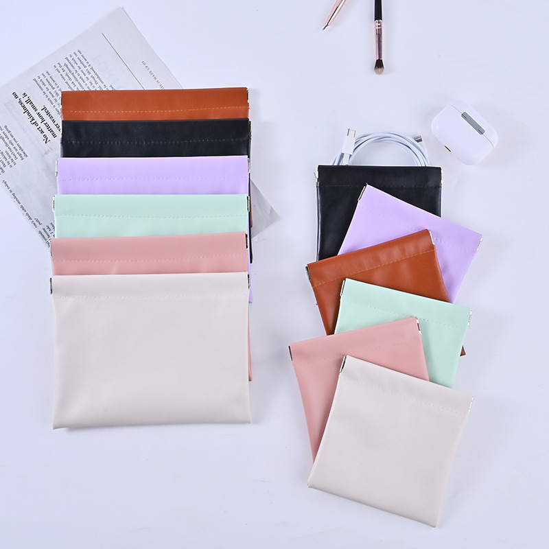 Factory wholesale leather tumbler pouches for collecting and storing items such as bracelets, Bluetooth earphones, data cables, keys, and coins.