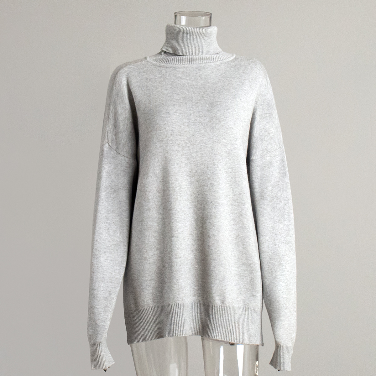 Suéter de cuello alto transfronterizo para mujeres 2025 otoño y invierno nuevo suéter casual estilo europeo y americano bifurcado suéter de punto de color sólido