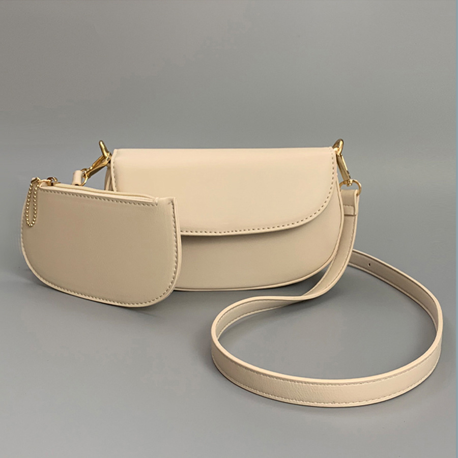 2025 moda bolsos de silla de montar de tendencia sólida Baise casual bolsos de hombro para enviar bolsos de tarjetas pequeñas del mismo color personalidad estética