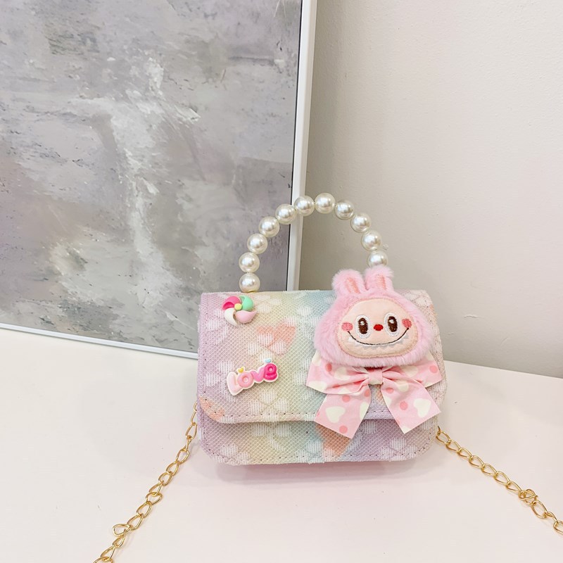 Bagos para niños 2025 nuevo estilo coreano de niña princesa bolso de cambio de mano lindo bolso de hombro de dibujos animados de peluche