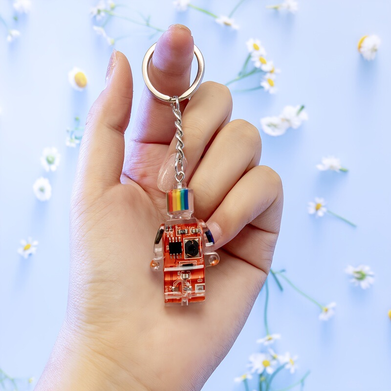 Factory Direct European and American hip hop punk style small electronic robot rainbow multi-color keychain men and women fashion brand