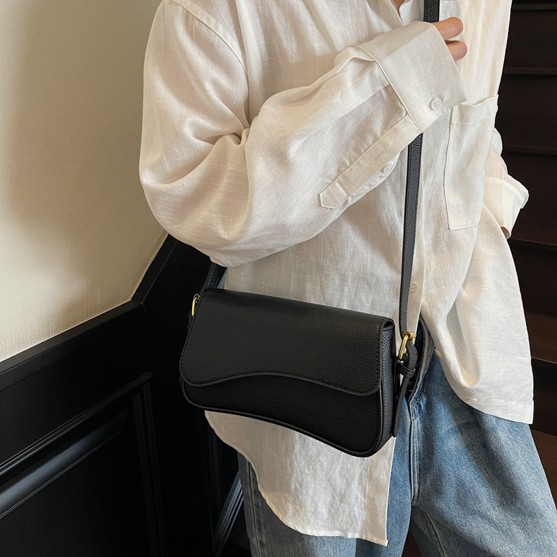 Bolso de textura transfronteriza 2025 verano nuevo bolso femenino moda patrón de lichi bolso de hombro simple bolso de mensajero de viaje