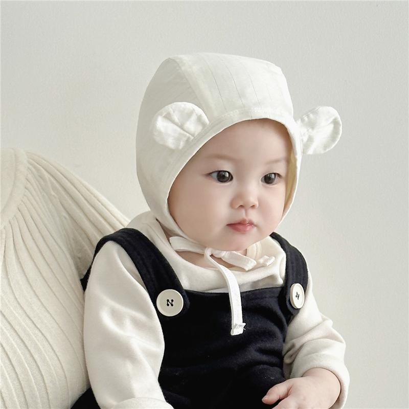 Sombreros para bebés primavera y otoño lindos gorros para orejas para hombres y mujeres bebés de un mes pequeño sombrero a prueba de viento primogénito