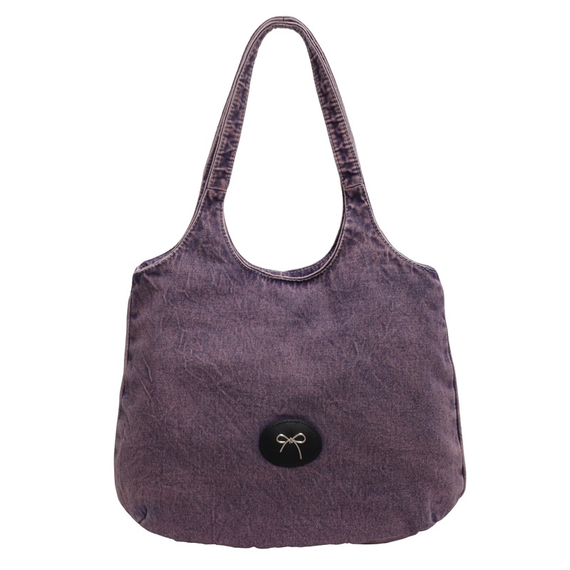Bolso de viaje retro de mezclilla de alta gama, bolso de viaje de marca de moda de moda femenina, bolso de axila de hombro simple y casual de gran capacidad