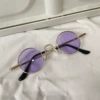 Medium round, gold frame, purple lenses