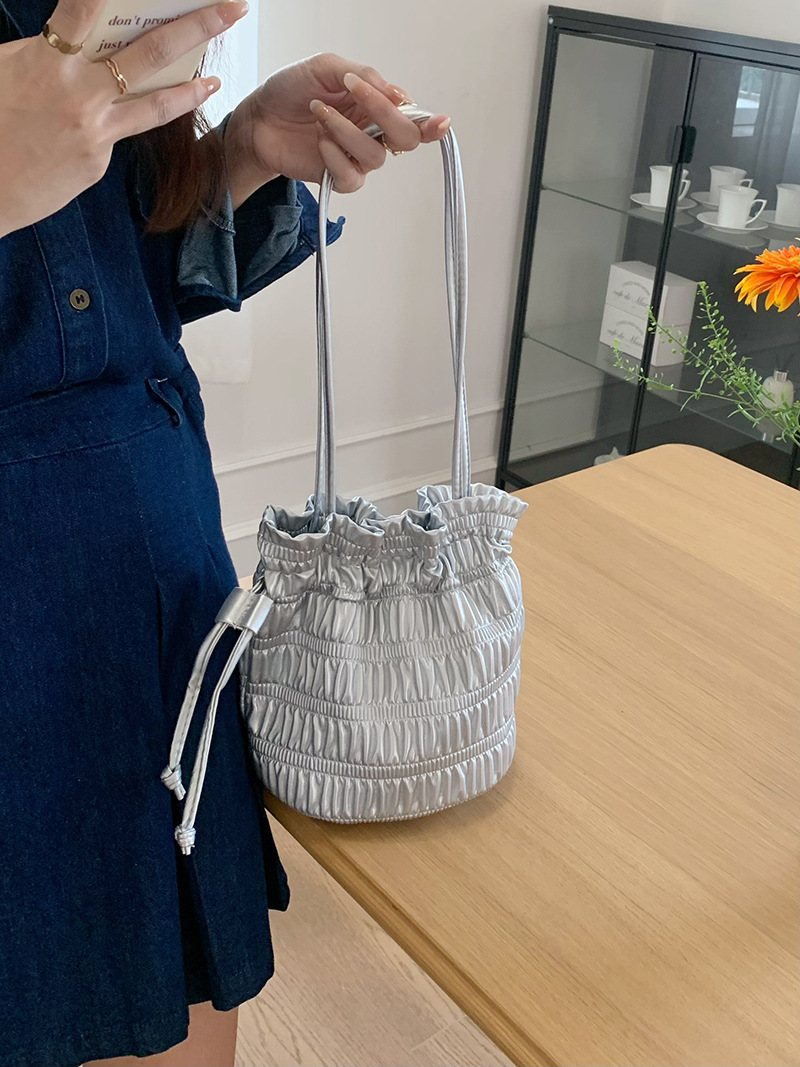 Korean INS niche design, gentle soft leather pleated drawstring bucket bag, one shoulder fashionable texture, silver_voghion.com