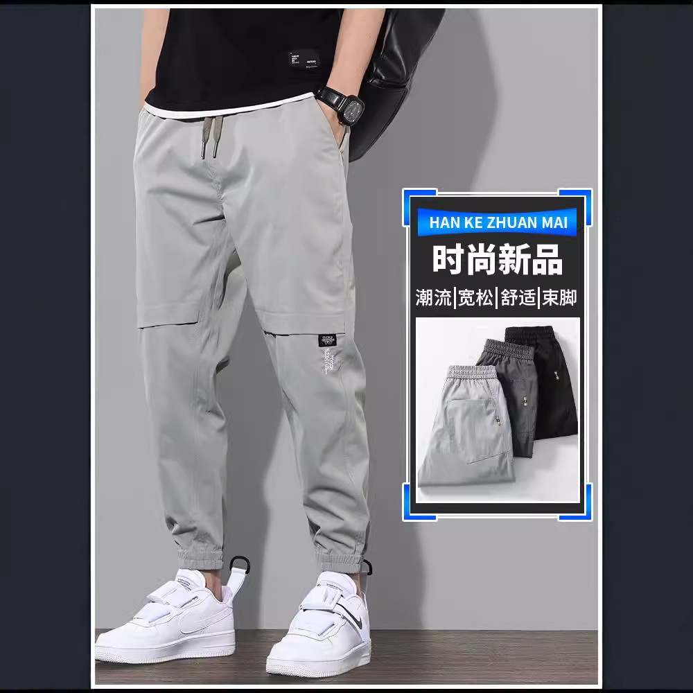 Ropa de trabajo de primavera y otoño pantalones largos pantalones casuales de los hombres pantalones sueltos atados al tobillo marca de moda de primavera y verano Pantalones deportivos delgados