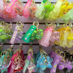 アニメの入油浮遊流砂瓶アクリルキーホルダー自動車キーホルダー卸売りアイデア小プレゼントバッチ
