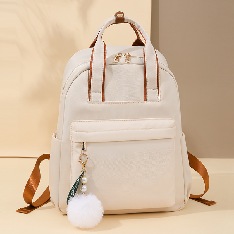 Mochila multiusos de gran capacidad para viajeros, nueva moda de color sólido, mochila de tela Oxford simple y versátil, viaje de gran capacidad