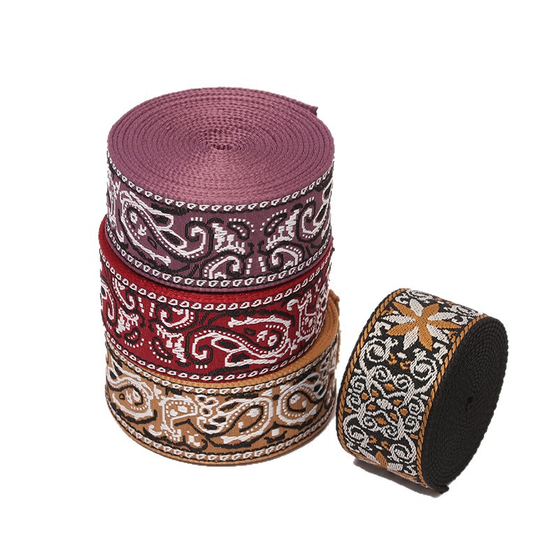 Cinturón de poliéster jacquard suministro directo cinturón de moda estilo nacional totem flor patrón de diamante retrógrado cinturón de tejido
