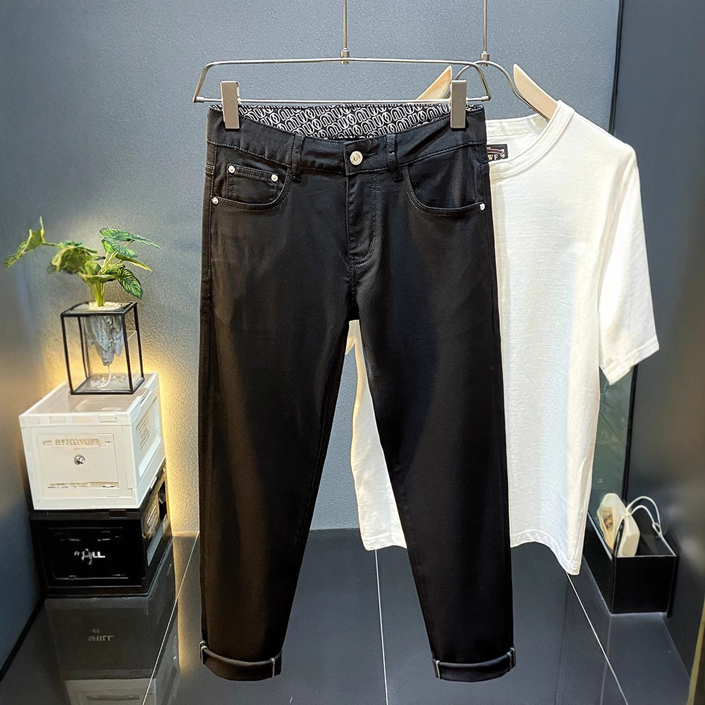 High-end Lesel verano delgado puro negro jeans hombre delgado pie pequeño pantalones americanos de calzado de calzado