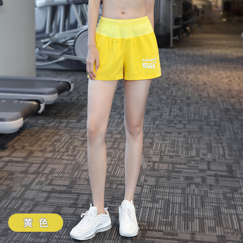 Fábrica de fuerza de tenis femenino forrado falso dos piezas de bádminton yoga deportivo rápido secado acondicionamiento físico pantalones de mujer