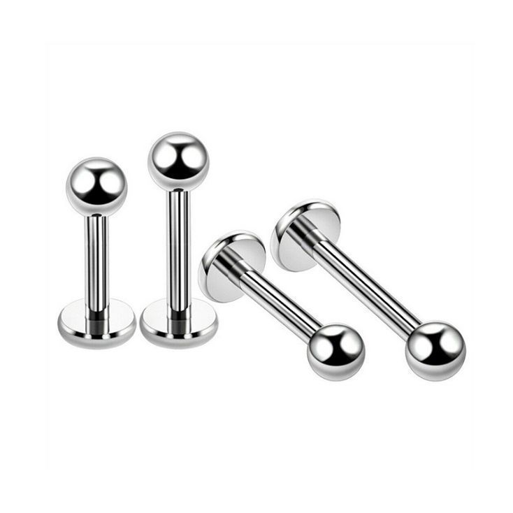 Silver pointed spike labret stud material detail