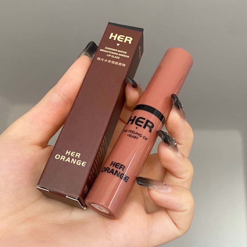 HERORANGE~shimmering water bright mirror surface lip glaze net red, the same type of film-forming water light sensitive glass lip color that is not easy to fade