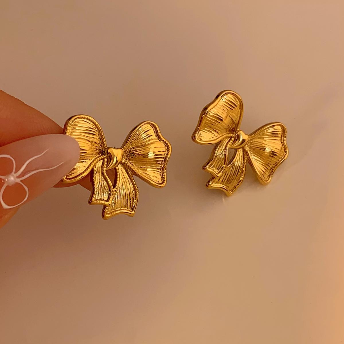 Orecchini alla moda popolari in acciaio inossidabile elettroplaccati con fiocco, di alta qualità, estivi, versatili, piccoli, freschi, squisiti, all'ingrosso_voghion.com