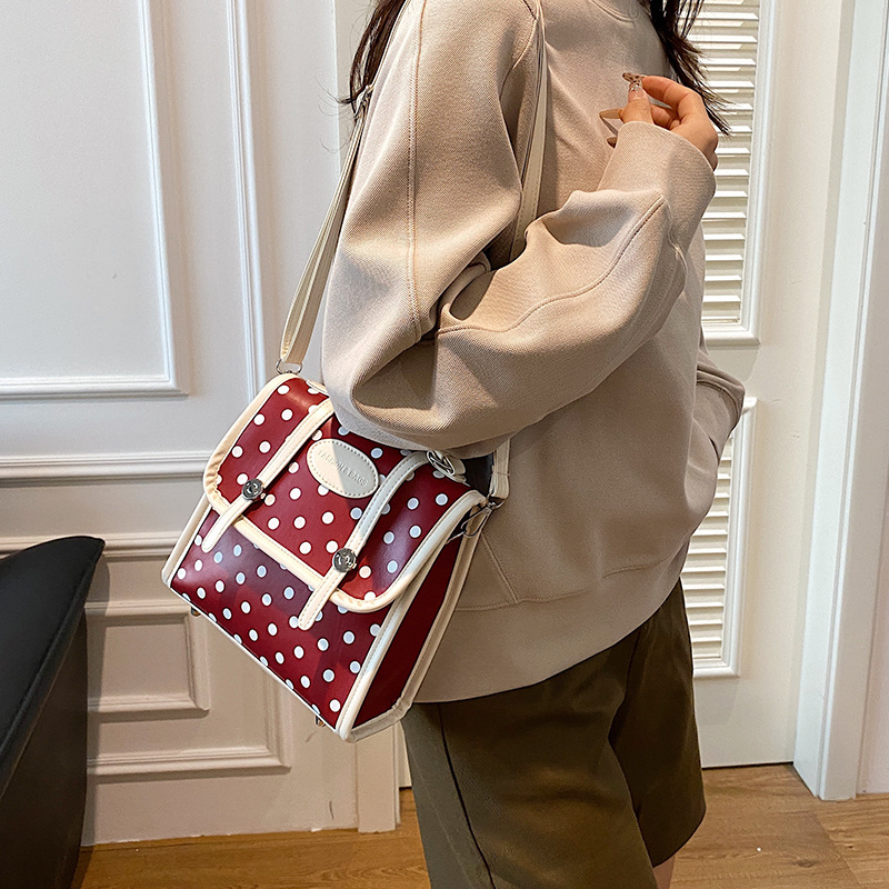 Mochila de estudiantes de ondas coreanas para mujeres 2024 nueva moda alta sensación de nicho de moda mochila de viaje