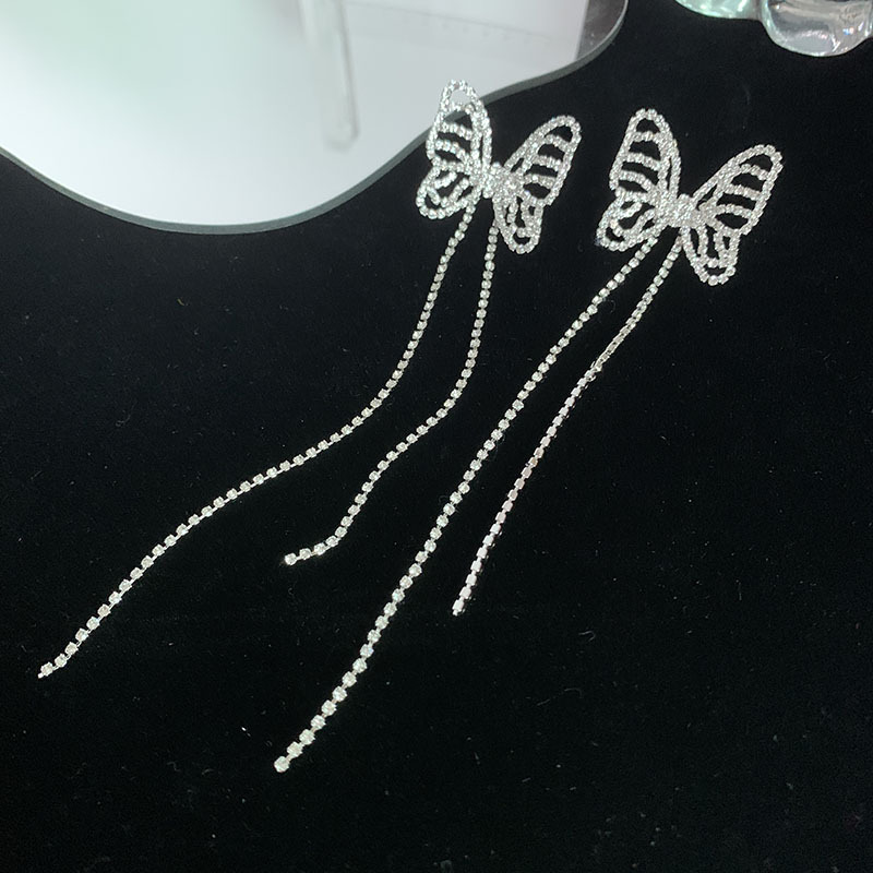 Nihaojewelry Fashion Hollow Butterfly Long Tassel Copper Earrings Wholesale Jewelry display picture 4