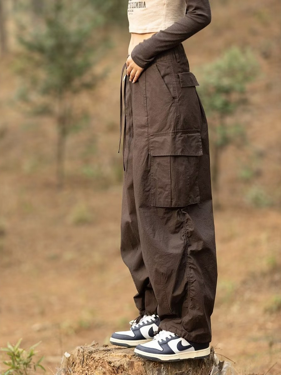 Estilo japonés americano al aire libre deportes delgados monopatín de pierna ancha los hombres y las mujeres con cordón ajustable suelta pantalones fregona