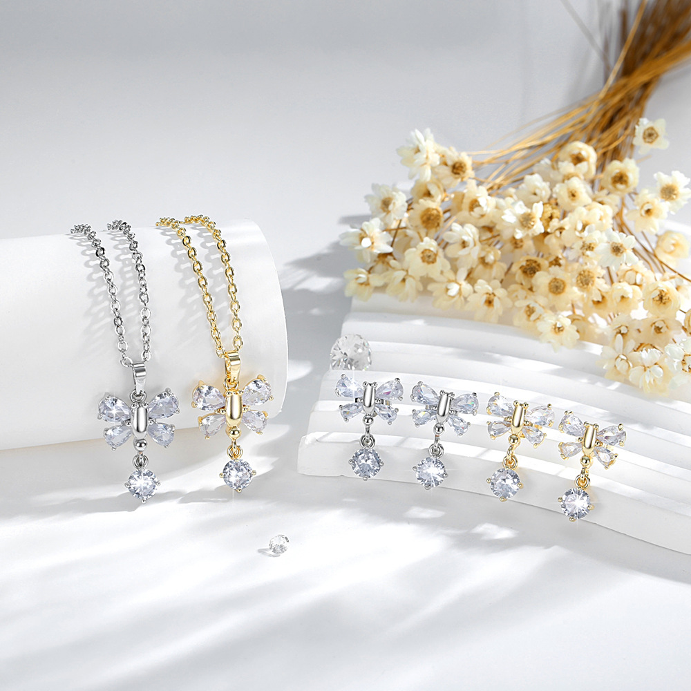 Transfronterizos de alto nivel sensación colgante mariposa conjunto de joyería de moda cobre 14K oro de color de cuentas de aretes de zircon collar