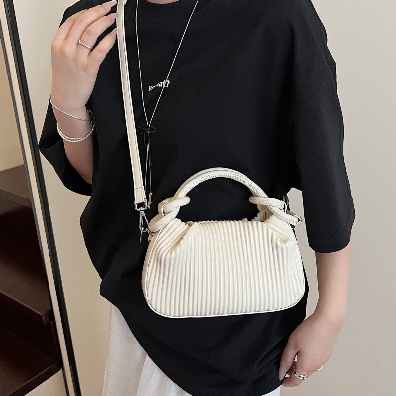 Versión coreana del bolso de nicho 2025 verano nuevo bolso femenino bolso de hombro fresco simple bolso de mensajero a rayas de moda