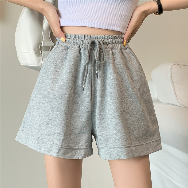 衛ズボンのショートパンツの女性の広脚の運動風の短いタイプの夏の薄いタイプの3分のカジュアルな高腰の女性のズボンの今年の流行のズボン